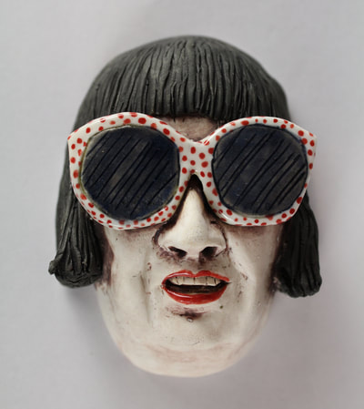 Porcelain Wall Hanging Woman wearing sunglasses